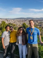 Guide and group posing during Montjuic Walking Tour