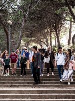 Montjuic tour with guests walking down stairs