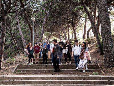 Montjuic tour with guests walking down stairs