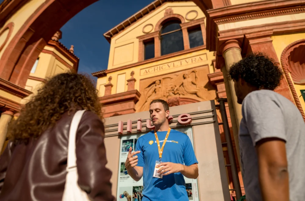 Tour guide explaining to tour guests during Montjuic Walking Tour