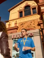 Tour guide explaining to tour guests during Montjuic Walking Tour