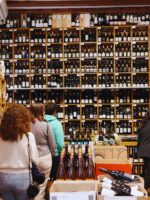 Guests browsing wine in Vila Vini Teca Store in Barcelona