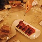 View of wine and Spanish Ham during Wine and Food Tasting in Barcelona