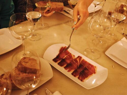 View of wine and Spanish Ham during Wine and Food Tasting in Barcelona