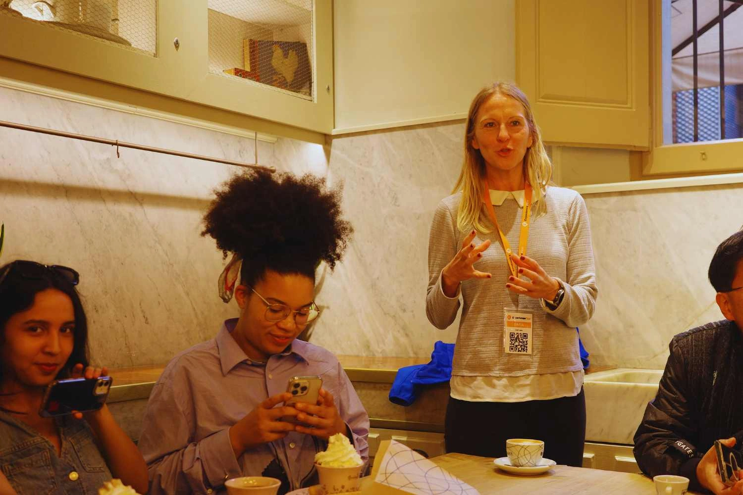 Tour guide explaining during Casa Batllo Insider Tour with chocolate breakfast