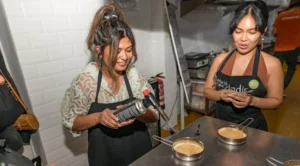 Guest torching their creation during Barcelona cooking class