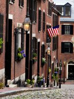 View of the historic architecture of Boston in Massachusetts, USA at Beacon hill showcasing its cobblestone street and colonial buildings on Boston walking tour
