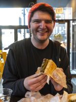 Tour Guide eating during Chicago Food and Culture Tour