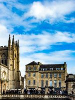 people walking near brown concrete building during daytime