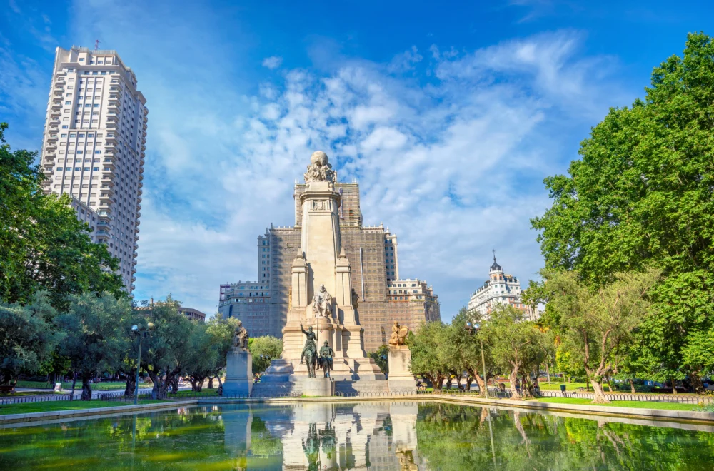 Cityscape with monument to Cervantes on Plaza de Espana seen in Highlights of Madrid walking tour