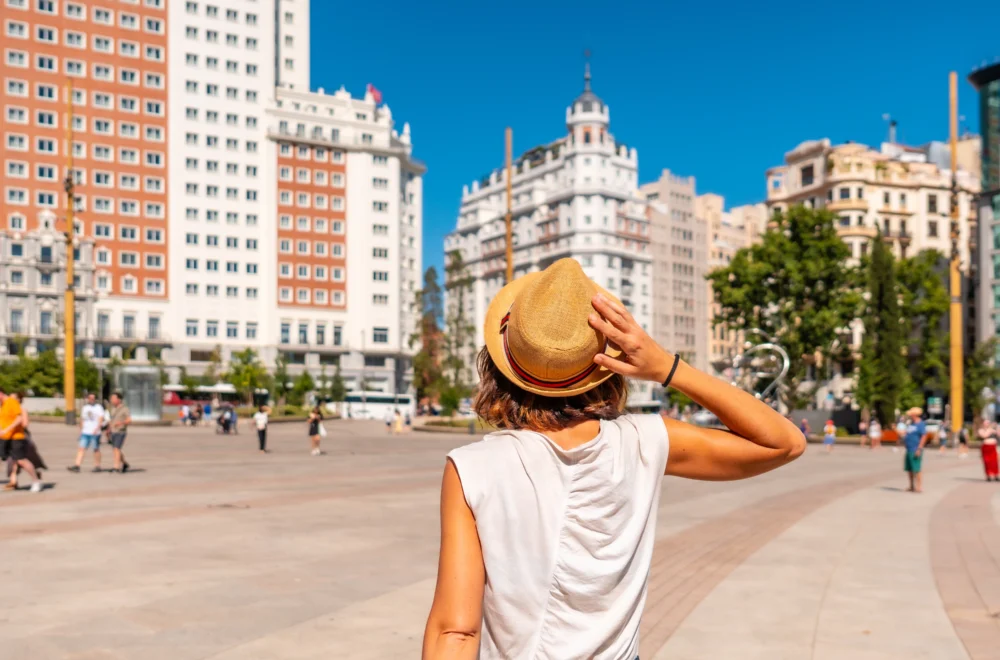 Young woman tourist in Plaza España in the center of the capital of Madrid Istock