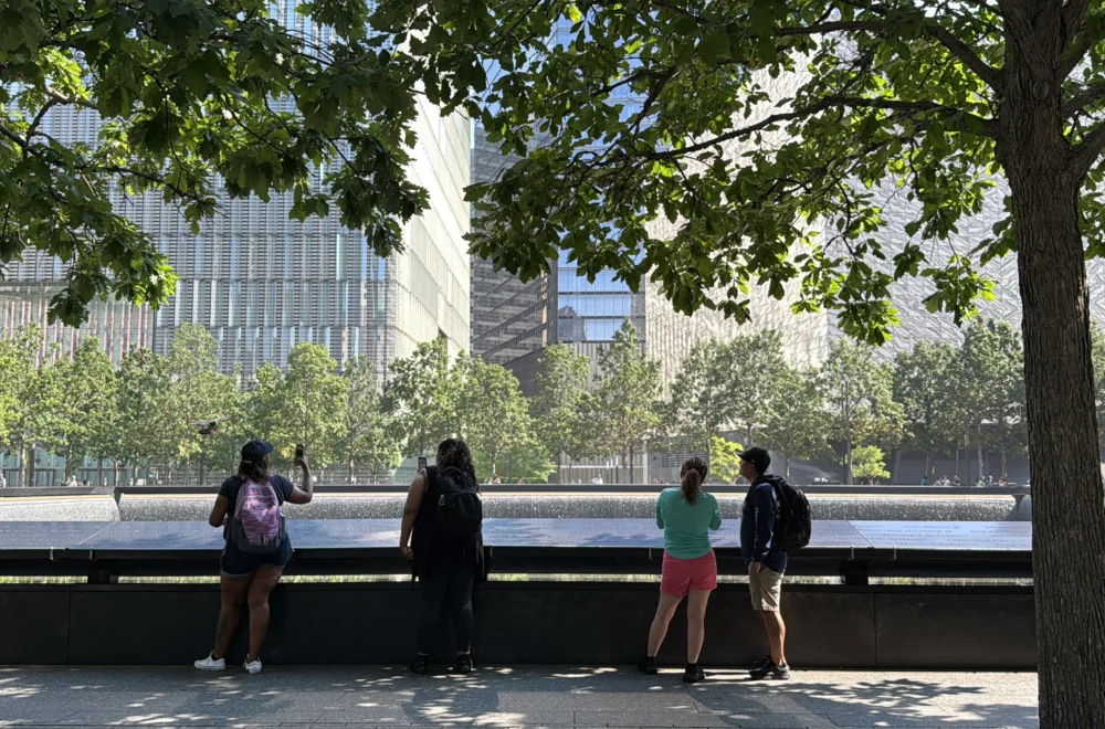 Guests at Ground Zero pool on Lower Manhattan Walking tour in July