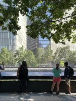 Guests at Ground Zero pool on Lower Manhattan Walking tour in July