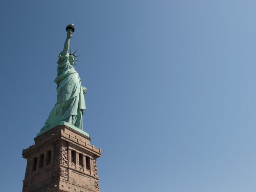Low-angle shot of Statue of Liberty during the day