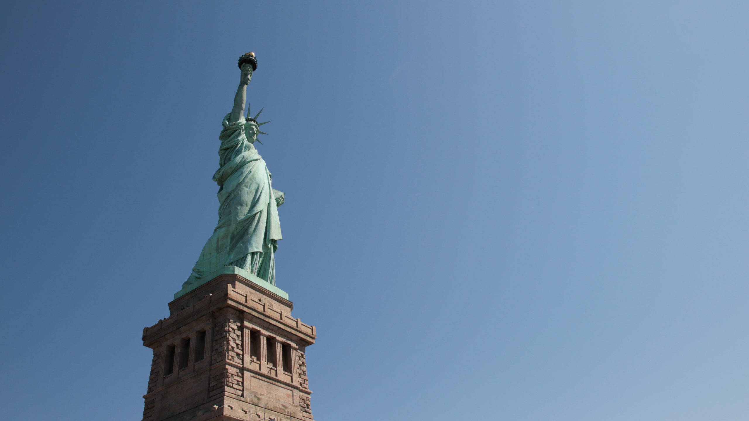 Low-angle shot of Statue of Liberty during the day