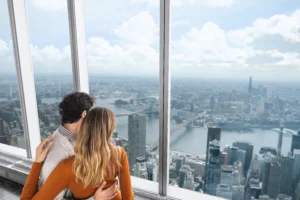 Couple looking at view at One World Observatory