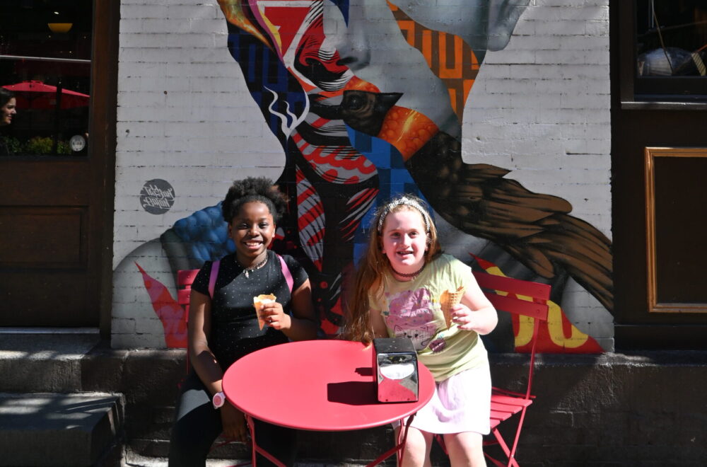 Two children posing during Soho, Little Italy and Chinatown guided tour