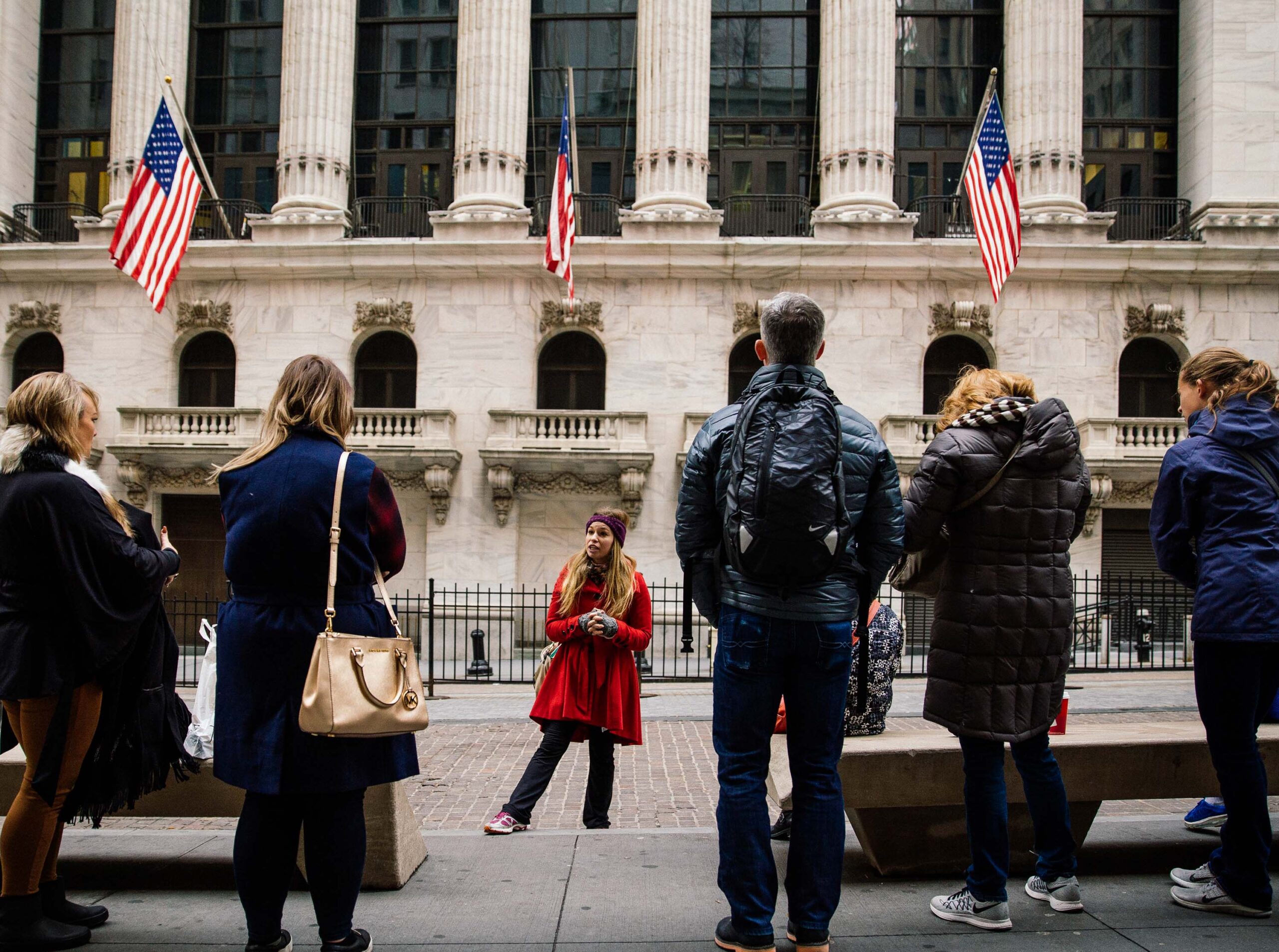 guide in lower Manhattan with NYC tour group