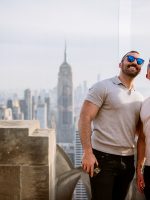 Two men taking a selfie at Top of the Rock in Rockefeller Center in New York
