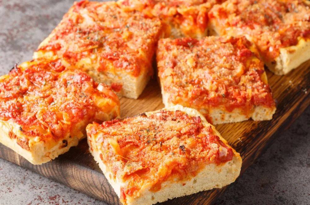 Pizza with onions tomatoes and cheese