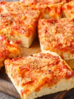 Pizza with onions tomatoes and cheese