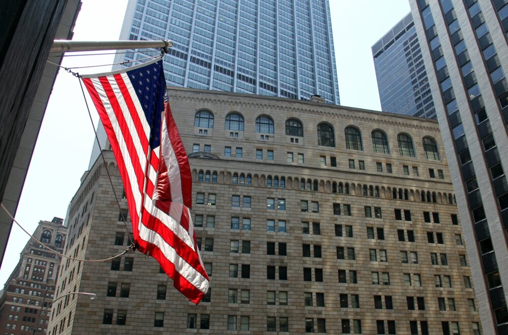 American Flag in front of Federal Reserve Building in Wall Street NYC