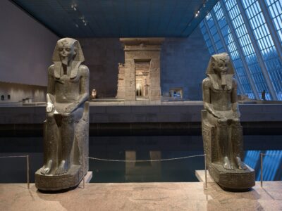 Two statues of Amenhotep III in the Temple of Dendur in the Met NYC