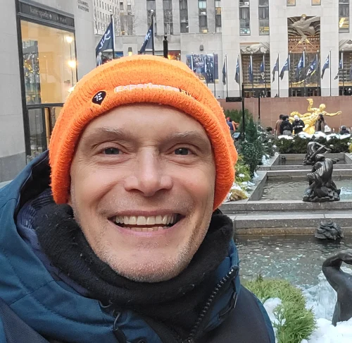 Guide Paul outside Rockefeller center