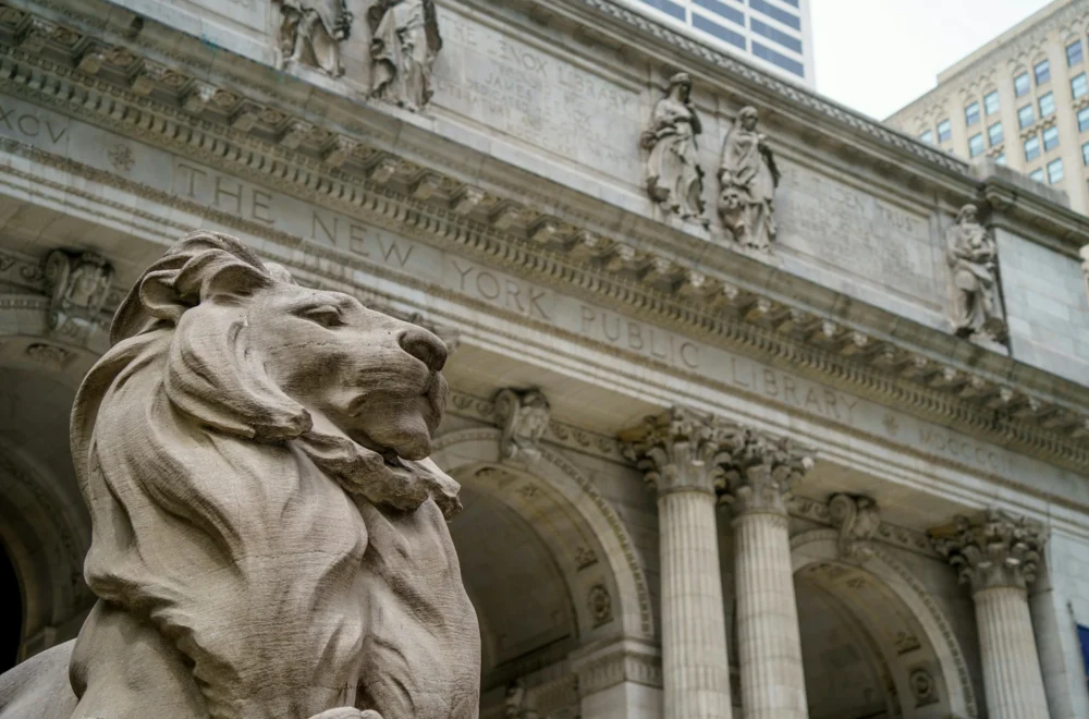 Close up of lions and entrance to New York Public Library during Midtown Walking Tour