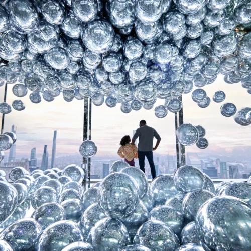 Father and daughter in Summit One Vanderbilt in NYC