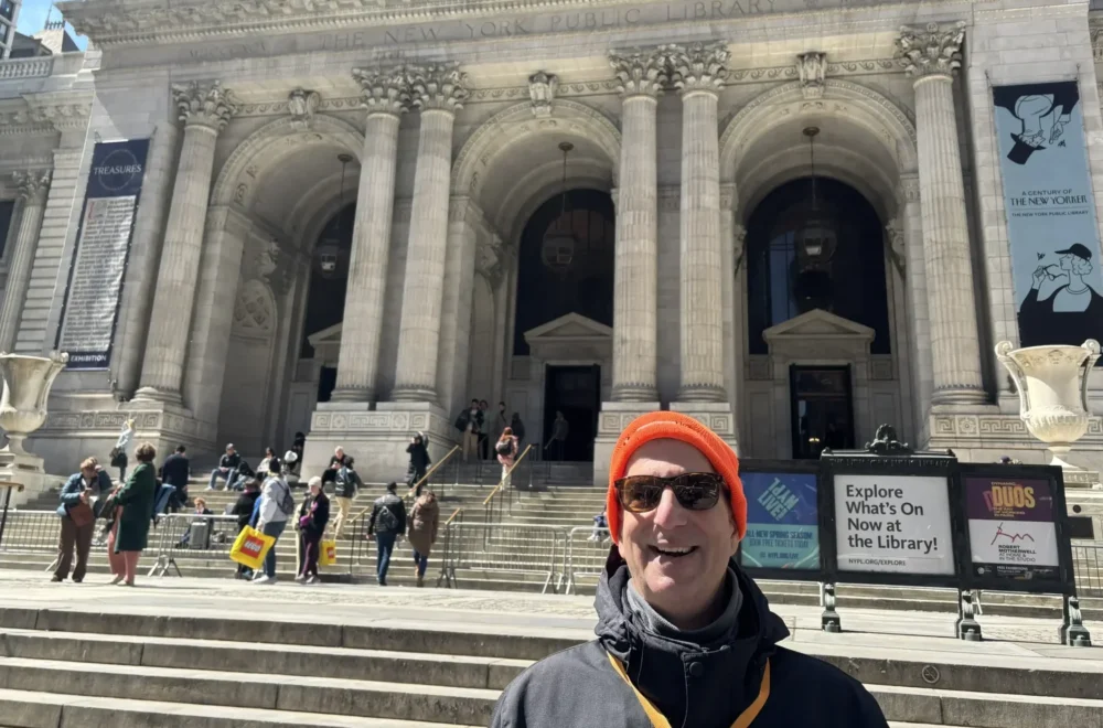 Guide in front of the NYPL on NYC architecture tour