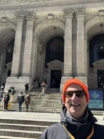 Guide in front of the NYPL on NYC architecture tour