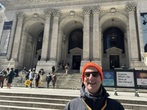 Guide in front of the NYPL on NYC architecture tour