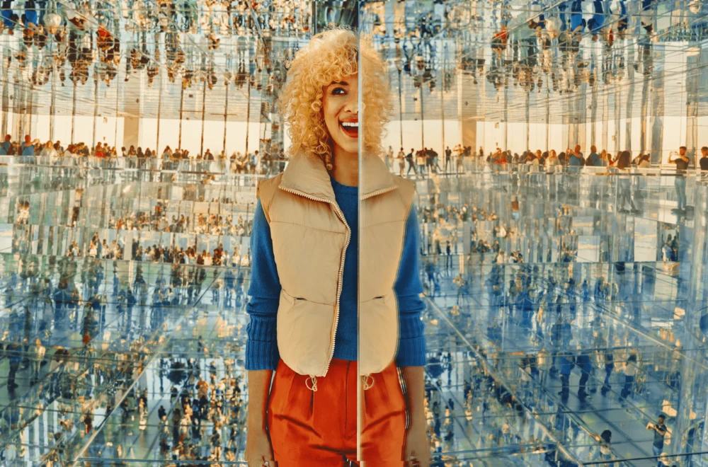 Women walking through exhibition in the Summit One Vanderbilt in NYC