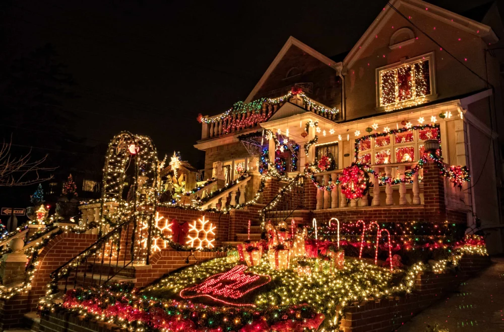 decorated house with holiday lights during Dyker Heights Christmas lights tour in NYC
