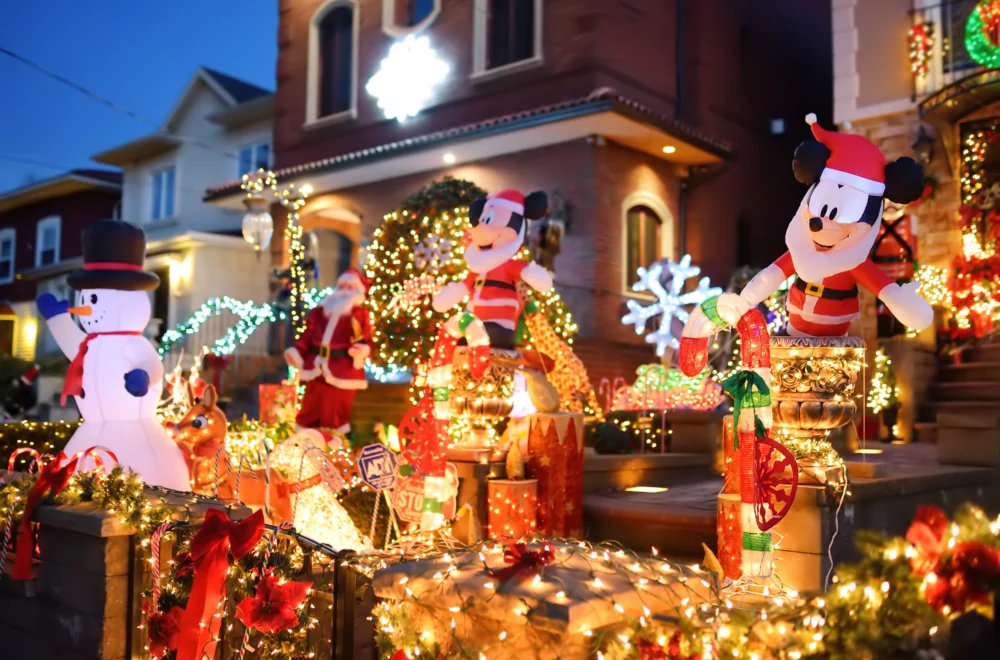 Dyker Heights Christmas decor featuring Mickey Mouse as Santa Claus