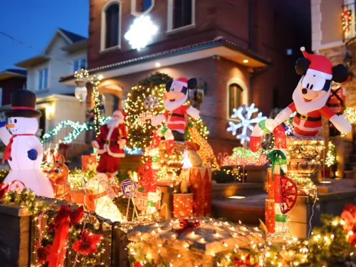 Dyker Heights Christmas decor featuring Mickey Mouse as Santa Claus