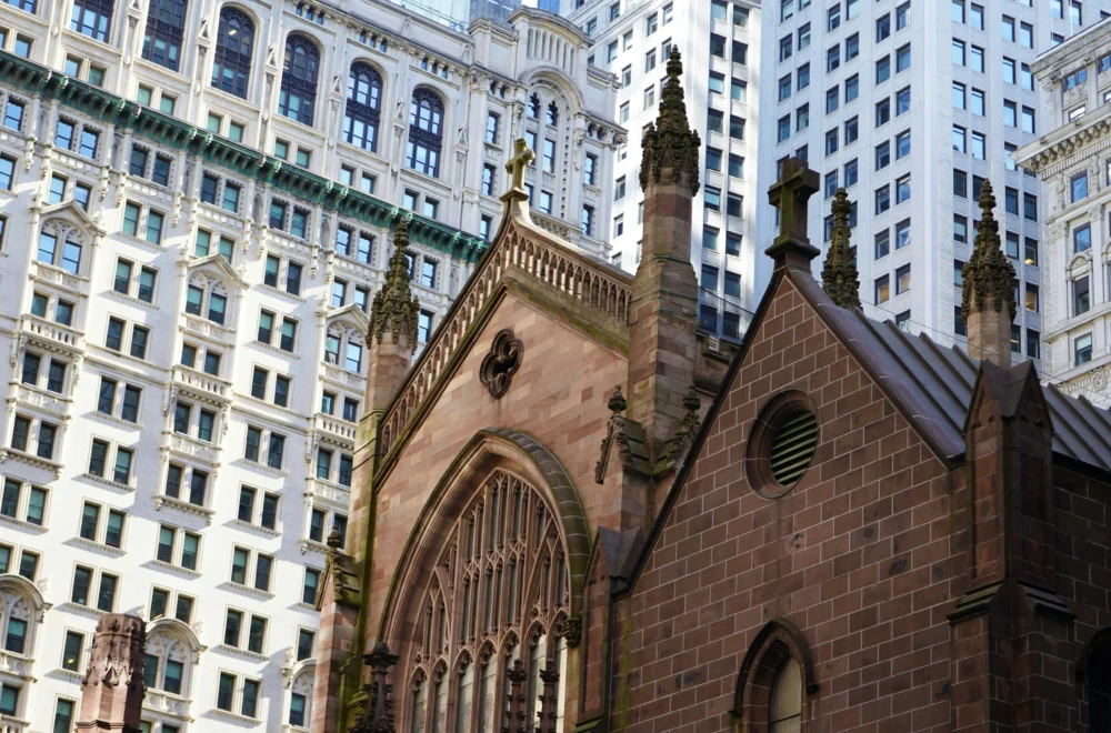 A beautiful juxtaposition of Trinity Church’s gothic architecture against the backdrop of modern skyscrapers in New York City