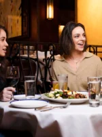 Guests at dinner table during Private Dinner with a Broadway Artist in NYC
