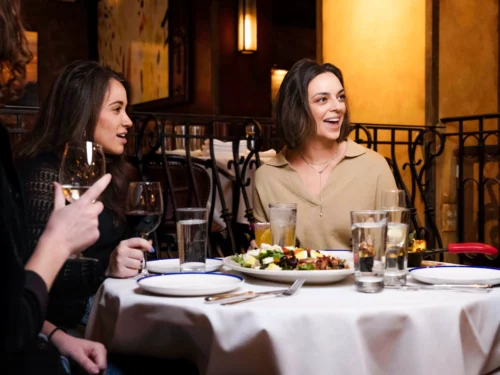 Guests at dinner table during Private Dinner with a Broadway Artist in NYC