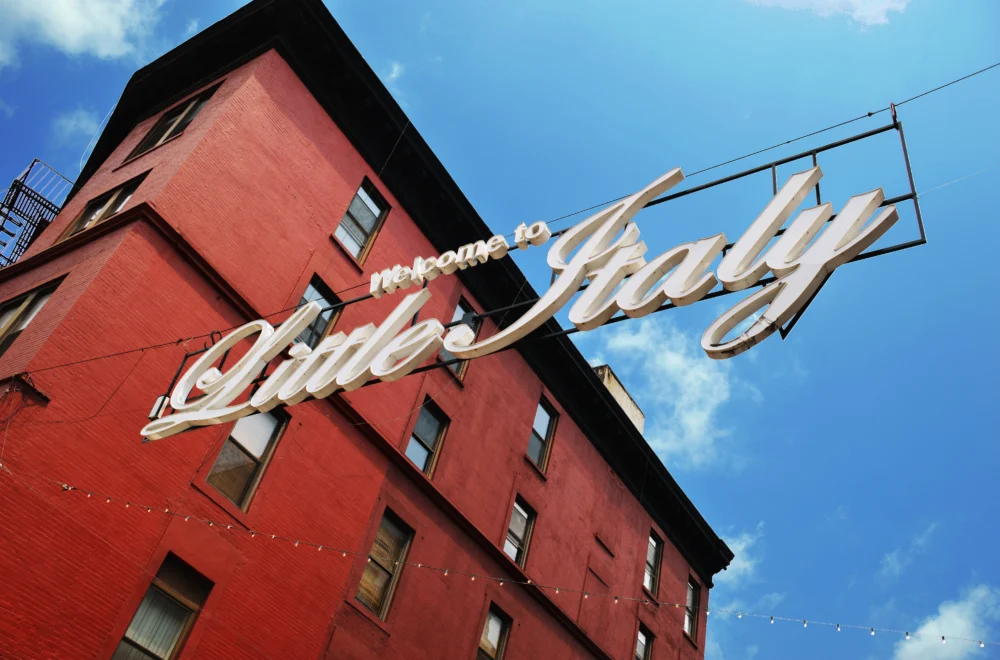 Low close-up shot of Little Italy neighborhood sign in NYC