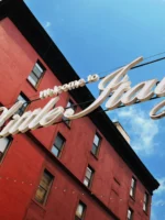 Low close-up shot of Little Italy neighborhood sign in NYC