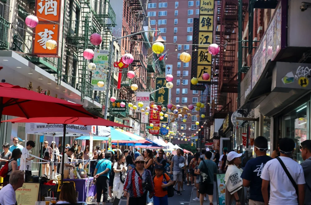 People walking down Chinatown in New York City