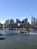 View of NYC skyline and Brooklyn Bridge on a sunny day