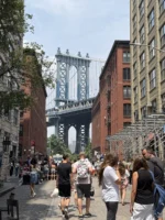 View of people and Brooklyn Bridge during private Beyond Manhattan guided tour