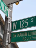 View of street signs in Harlem, New York City