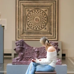 Woman sitting on bench in The Met during private NYC guided tour