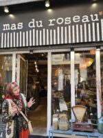 Tour guide introducing Mas du Roseau, a charming boutique in the heart of Le Marais.