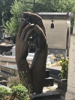 montparnasse cemetery hands sculpture