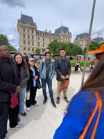 Guests listening to Notre-Dame tour guide in Paris